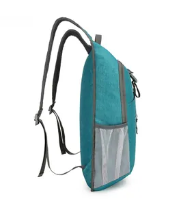 Side view of foldable cycling backpack with blue water-resistant fabric and mesh straps