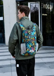 Outdoor folding cycling backpack with colorful leaf patterns and grey mesh side pockets
