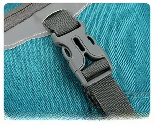 Macro detail of high-quality gray buckle and durable teal nylon strap on hiking backpack