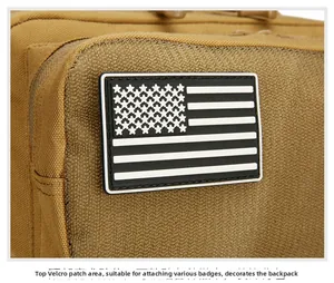 Tactical backpack detail showing hook-and-loop patch area with American flag on nylon