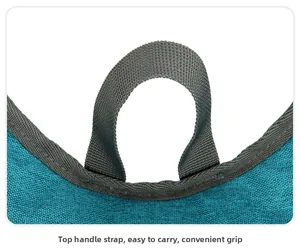 Detail of grey nylon handle strap stitched on blue textured waterproof cycling backpack