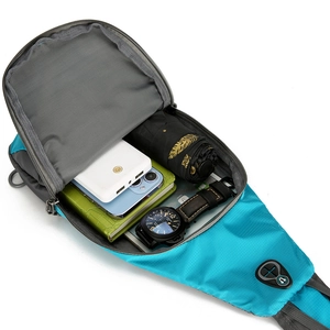 Hiking daypack crossbody bag in blue with large capacity interior for daily essentials