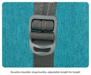 Detail of adjustable gray strap and plastic buckle on lightweight blue travel backpack