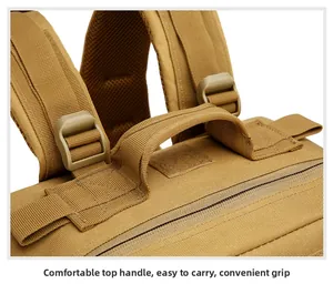 Close-up of tactical backpack featuring reinforced top handle and padded mesh shoulder straps