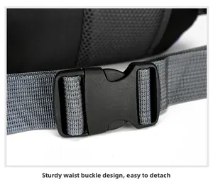 Detail of durable black plastic buckle and grey nylon webbing on outdoor hiking backpack
