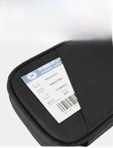 Detail view of the front pocket of a waterproof travel passport bag with ticket insert