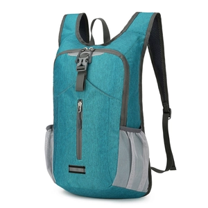 Lightweight foldable outdoor hiking backpack in teal blue with spacious compartments