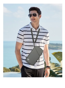 Detail of grey waterproof phone bag with RFID blocking logo and detachable shoulder strap