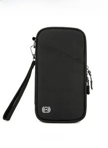 Detailed view of black RFID blocking travel organizer with front pocket and metal hook