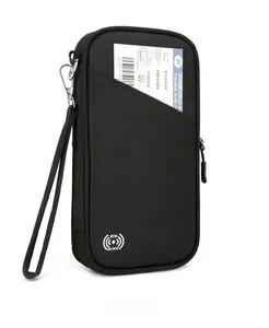 Detail of RFID blocking travel passport holder with front pocket for boarding passes