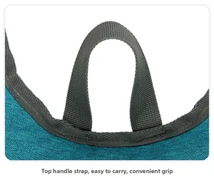 Detail of the top gray webbing handle on the water-resistant cycling backpack