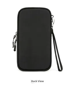 Back view of waterproof black travel passport holder with durable zipper and carabiner