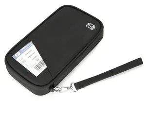 Detail view of water-resistant RFID blocking passport wallet with a detachable wrist strap
