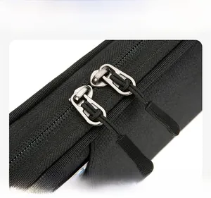 Detail of durable dual zippers and water-resistant fabric texture on the passport holder