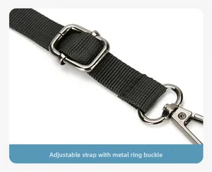 Detail of adjustable black woven shoulder strap with polished dark grey metal buckle