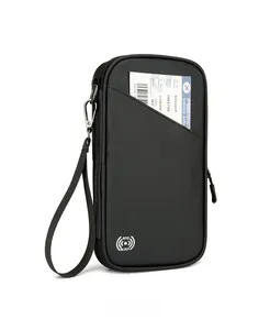 Detail view of the RFID blocking passport holder with exterior boarding pass pocket