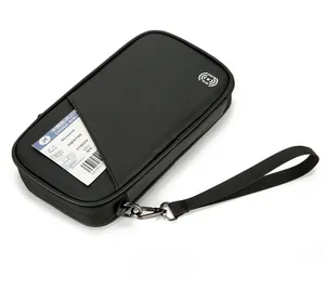 Detailed view of RFID blocking travel passport wallet with removable wrist strap and card slot