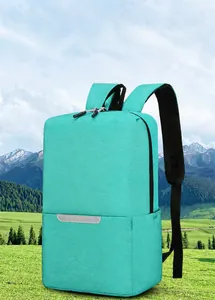 Detail of mint green lightweight backpack featuring reflective safety strip and side pockets