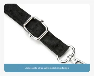 Detail of adjustable black shoulder strap with silver metal buckle and swivel hook clips
