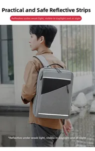Grey business backpack detail showing reflective safety strips for low-light visibility