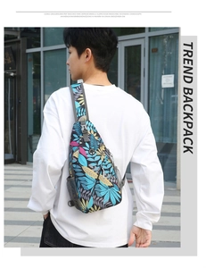 Close-up of lightweight chest bag featuring vibrant tropical leaf prints and mesh side pocket