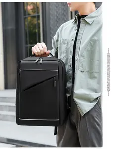 Detail of black business laptop backpack featuring diagonal zipper and modern silver lines