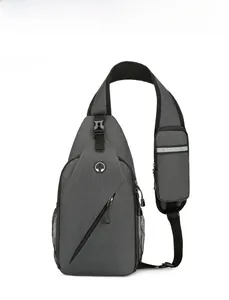 Detailed view of dark grey sports sling bag with side mesh pocket and headphone port