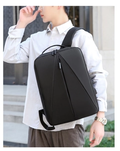 Sac à dos noir imperméable pour homme avec design géométrique et compartiment ordinateur