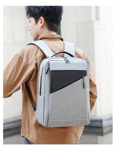 British style grey business laptop backpack with modern black contrast stitching and side pockets