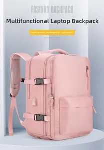 Sac à dos voyage rose avec port de charge USB externe et multiples compartiments de rangement