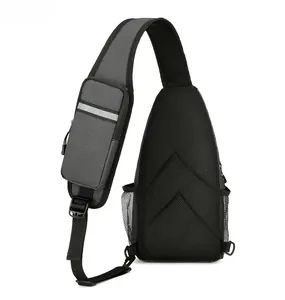 Detail of the breathable mesh back panel and safety reflective strips on the chest bag