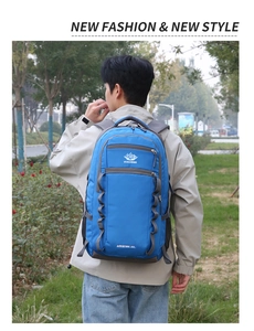 Close-up of blue 55L adventure backpack featuring durable fabric and side adjustment straps