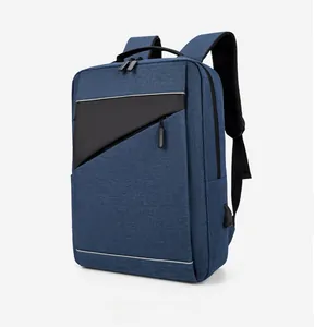 Detail view of business laptop backpack featuring side USB charging port and reflective strip