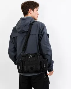 Detail of multi-functional waterproof black outdoor shoulder bag with tactical webbing