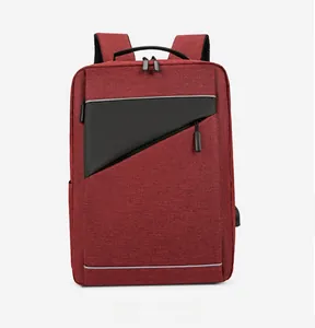 Front detail of burgundy business backpack with USB port and reflective safety strip