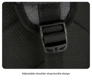 Detail of adjustable shoulder strap buckle on a black mesh sports chest bag