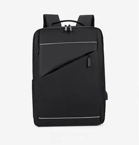 Front view of black business laptop backpack showing USB port and reflective safety strips