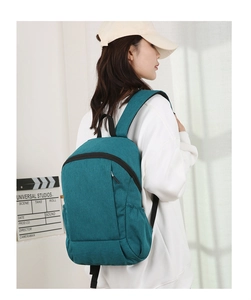 Détail du sac à dos de sport extérieur léger en vert paon avec fermetures éclair noires