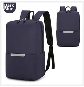 Detail view of navy blue oxford laptop backpack with silver safety reflective strip