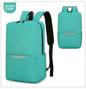 Detail view of mint green lightweight backpack featuring high-visibility reflective strip