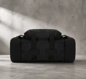 Detail of durable black nylon tactical pouch with MOLLE straps and velcro surface