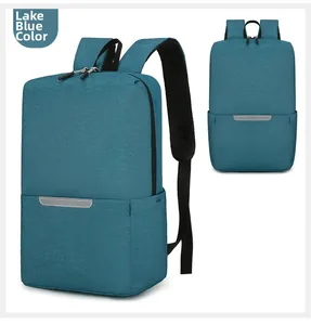 Detail view of lake blue laptop backpack with reflective safety strip and mesh side pocket