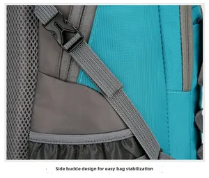 Detail view of the durable side buckle and nylon webbing on the blue hiking backpack