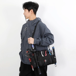 Sac banane de pêche étanche noir avec porte-canne et système tactique MOLLE