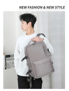 Sac à dos de voyage gris foncé imperméable avec fermetures éclair et boucles latérales