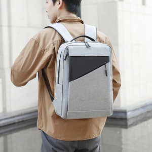 Business laptop backpack in grey fabric and black leather trim for commuting or travel