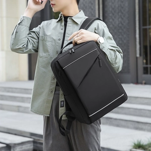 Business laptop backpack in matte black with reflective safety strips for daily commuting
