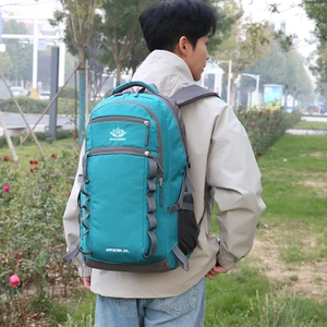 Green 55L outdoor hiking backpack for adventure with padded straps and multiple compartments