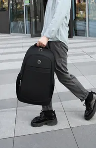 Detailed view of large black waterproof business backpack with side mesh pocket for water bottle