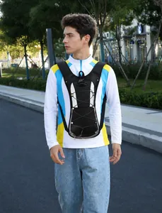 Outdoor cycling backpack in black with reflective silver details and cross bungee cords